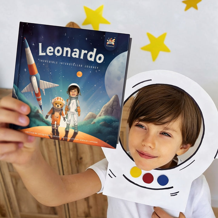 Boy in a paper astronaut helmet holding up his personalized Elfink space storybook Incredible Interstellar Journey with his own face on the cover